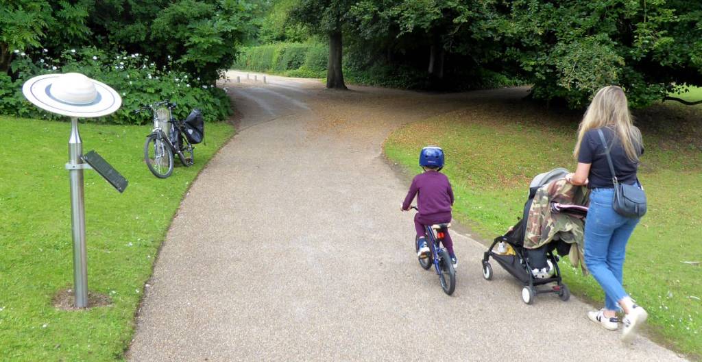 A scale model of Saturn beside a cycle path