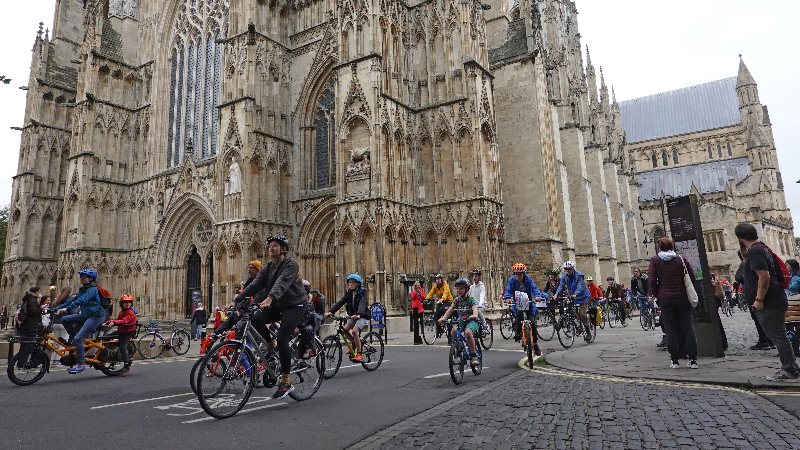 A group of riders in front York Minster